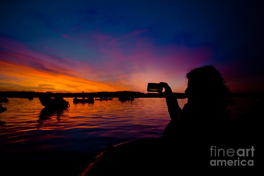 Mobile shooting Boats and Sunrise above lake water summer time Latvia Ezera skanas Photograph by Raimond Klavins