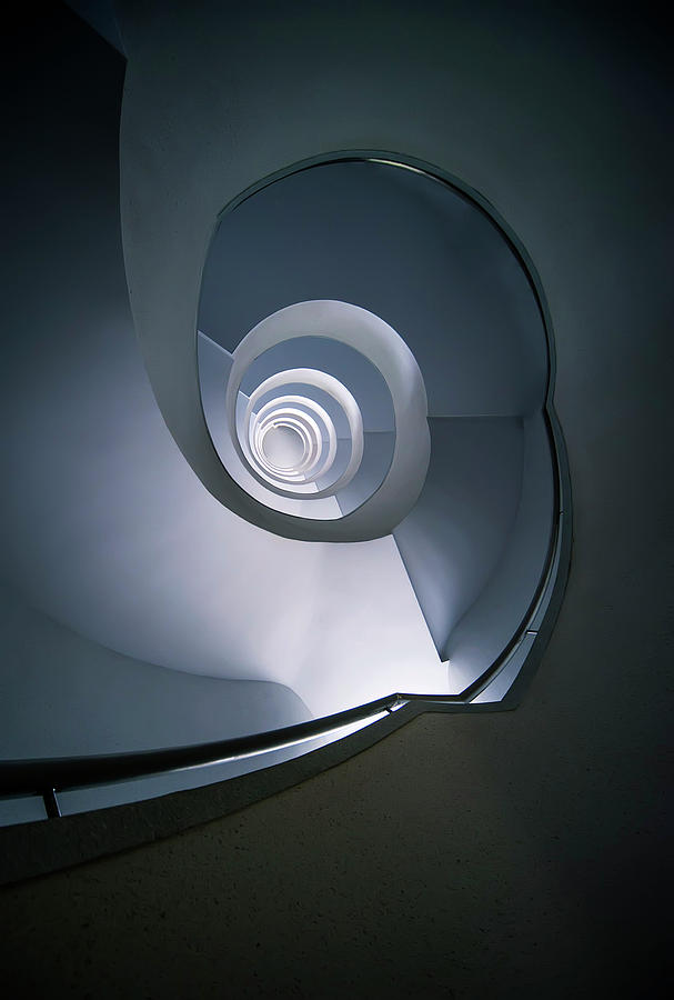 Modern blue spiral staircase Photograph by Jaroslaw Blaminsky