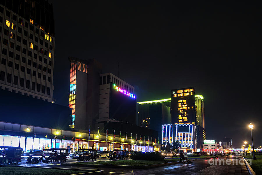 Modern Buildings In Phnom Penh City Street Cambodia At Night Photograph by JM Travel Photography
