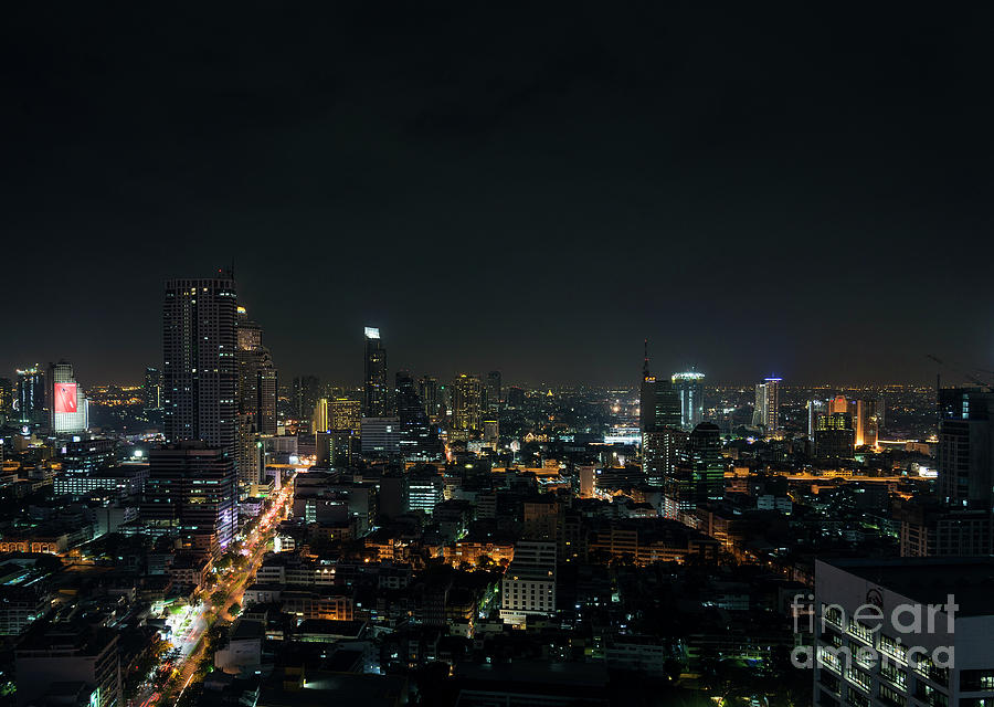 Architecture Photograph - Modern Buildings In Silom Area Of Bangkok Thailand At Night by JM Travel Photography