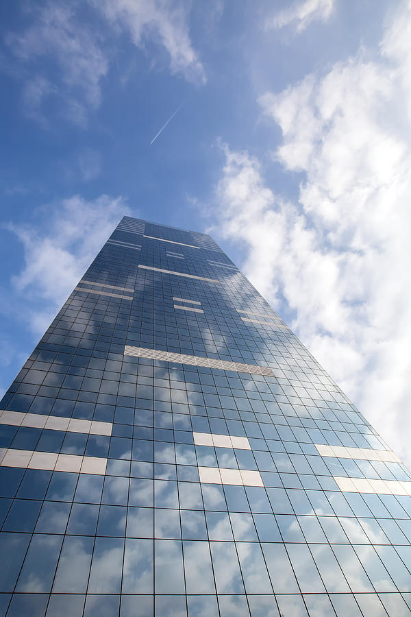 Modern Office Building On Sky Background With Clouds Reflection Photograph