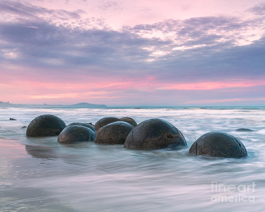 Moeraki boulders at sunset - New Zealand Photograph by Matteo Colombo