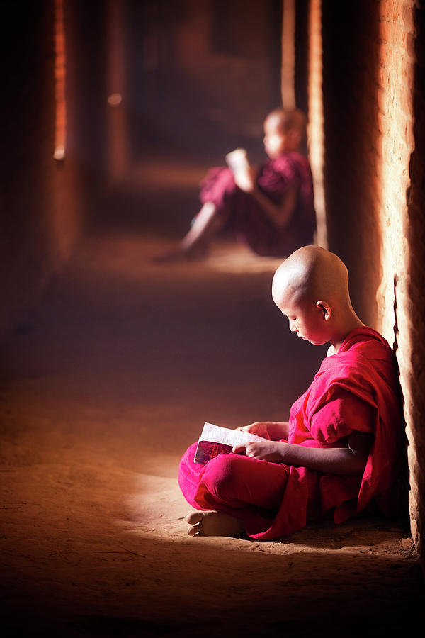 Monk study in temple Photograph by Anek Suwannaphoom