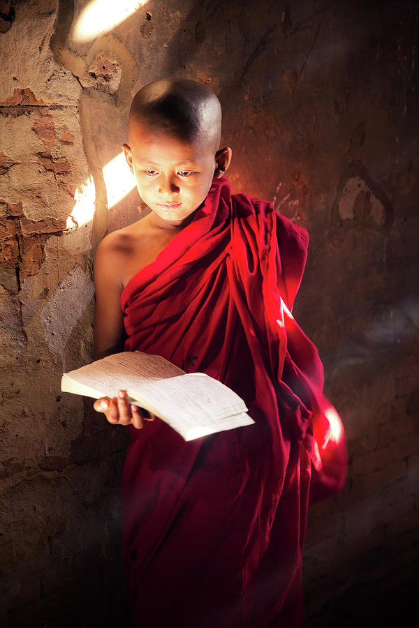 Monk study in temple by read a book Photograph by Anek Suwannaphoom