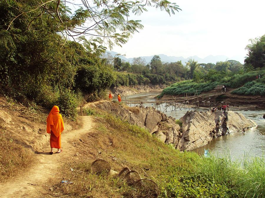 Monks on The Mekong Photograph by Mark Mitchell