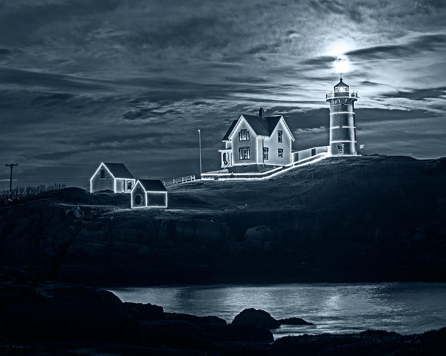Monochrome Blue Nights The supermoon rising over the Nubble Lighthouse York Maine Reflection Photograph by Toby McGuire