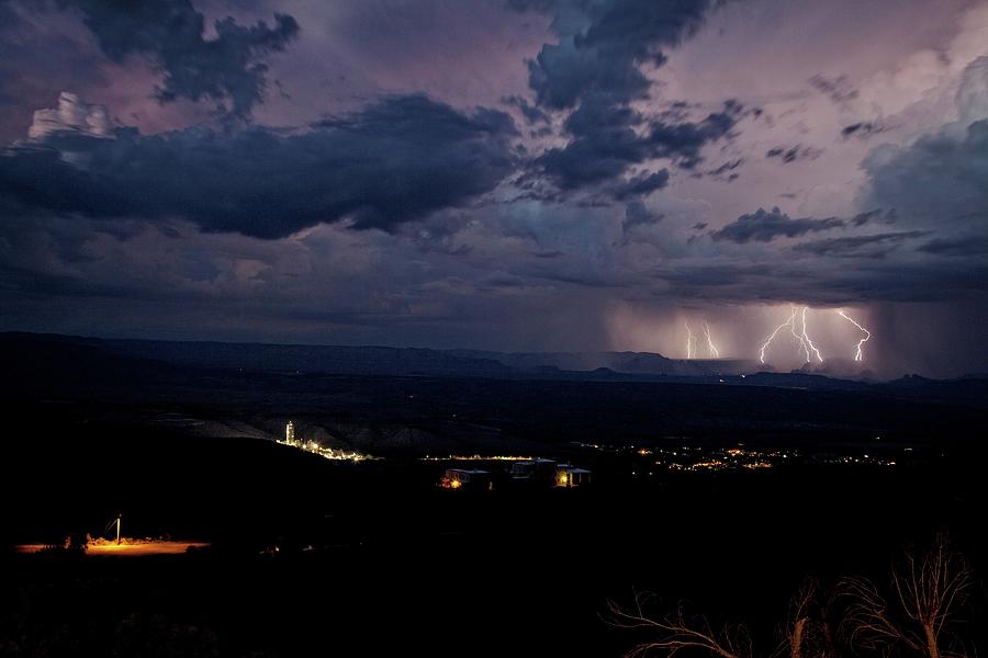 Monsoon Lightning over Sedona from Jerome AZ Photograph by Ron Chilston