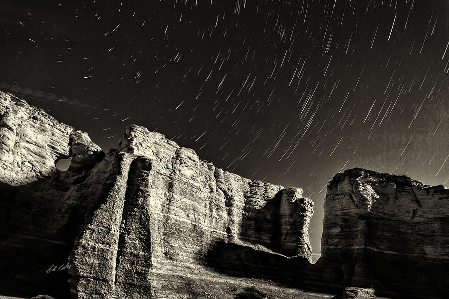 Monument Rocks Star Trails - Black-and-White Photograph by Bill Kesler
