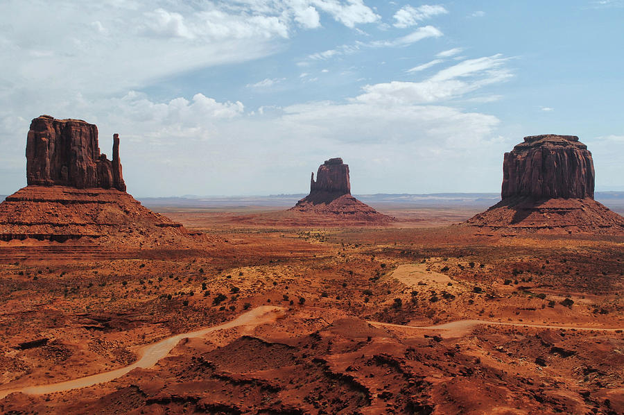 Monument Valley - The Mittens Photograph by Tricia Marchlik