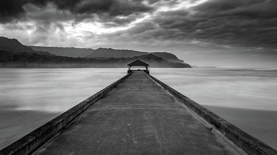 Black And White Photograph - Moody Hanalei Pier in Black and White by Pierre Leclerc Photography