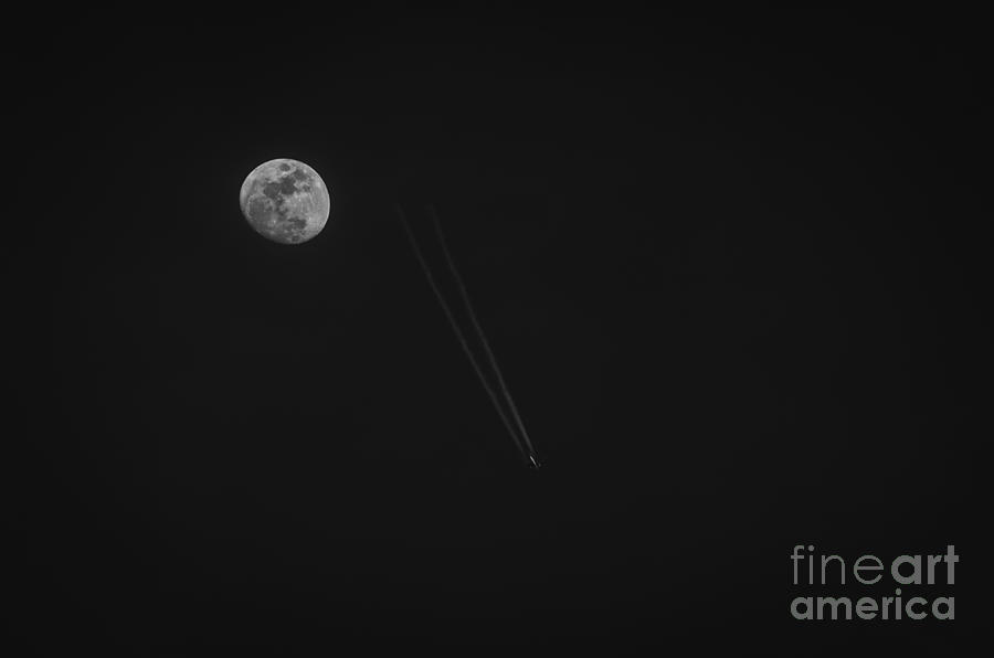 Moon Fly By Photograph by Debra Martz
