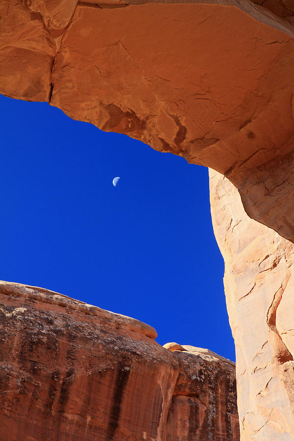 Moon Framed By Arch In Arches National Park Photograph
