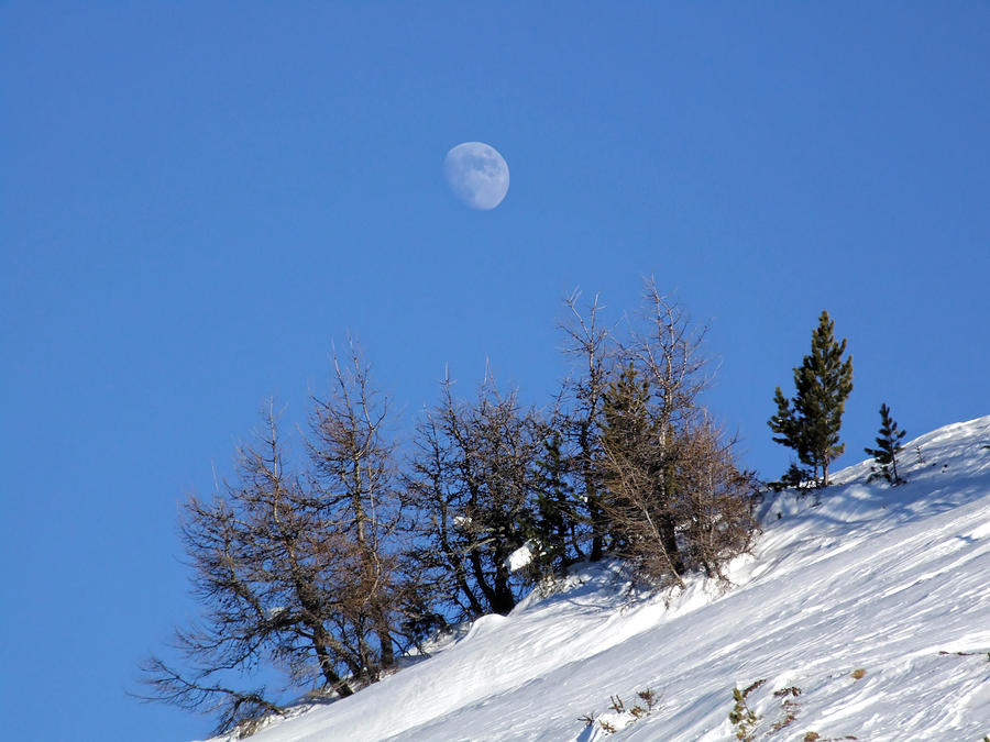 Moon in the Mountains Photograph by Hartmut Knisel