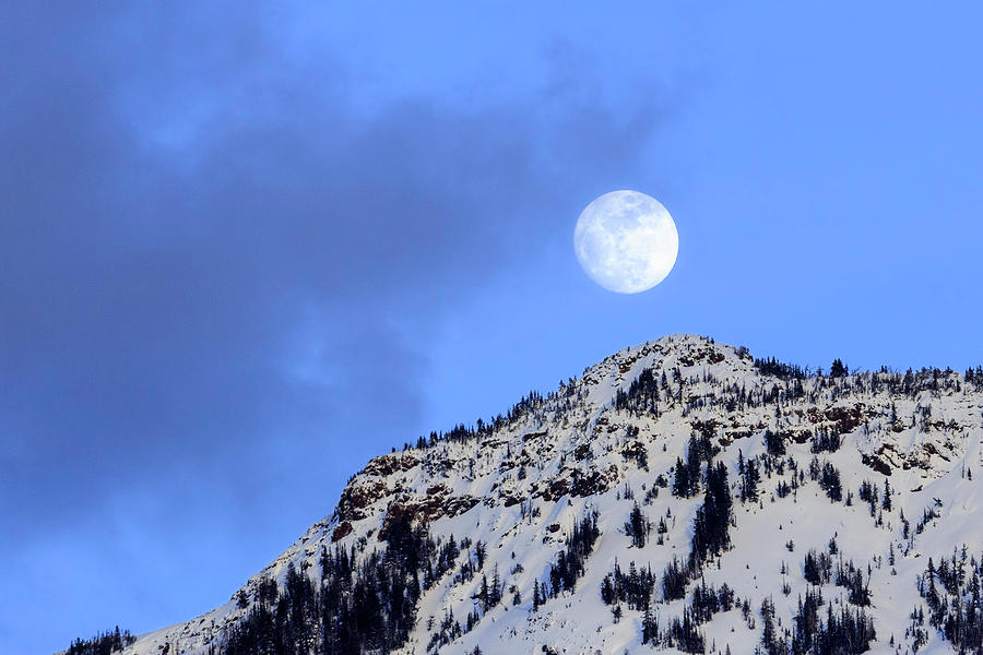 Moon Over Yellowstone Photograph by Jack Bell