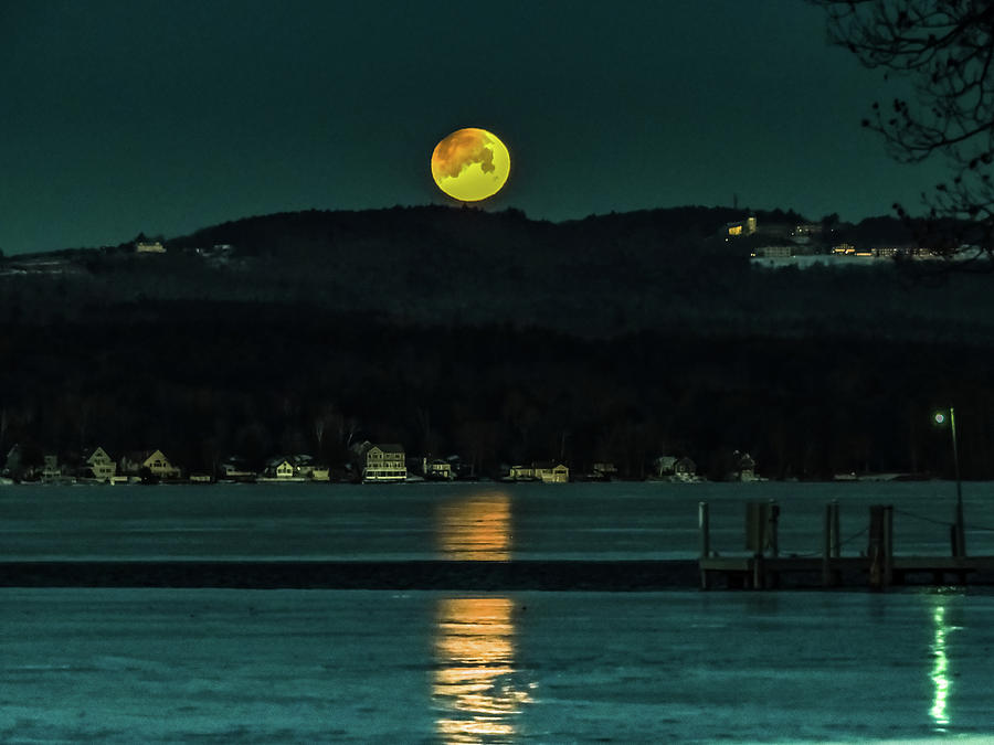 Moon Setting over Winnisquam Photograph by Mim White