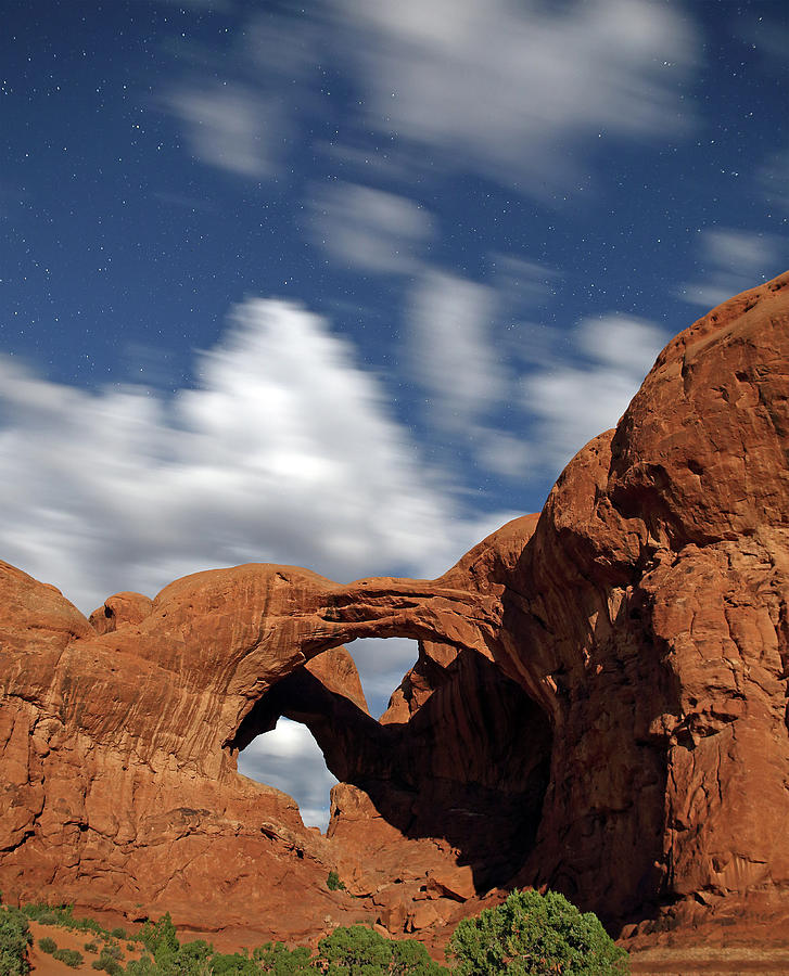Moonlight on Double Arch in Arches NP Photograph by Jean Clark