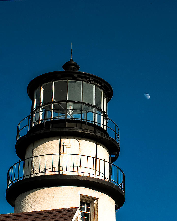Moonrise over Highland lighthouse Photograph by Jeff Folger