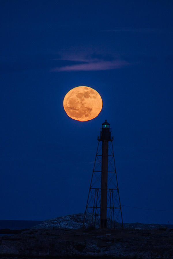 Moonrise over Marblehead lighthouse Photograph by Jeff Folger