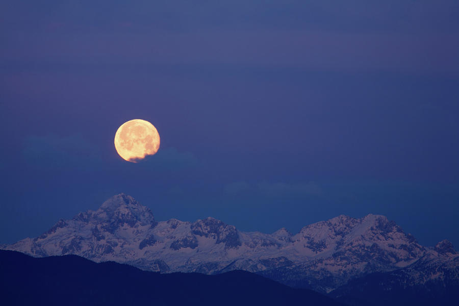 Moonset over Mount Triglav in the Julian Alps Photograph by Ian Middleton