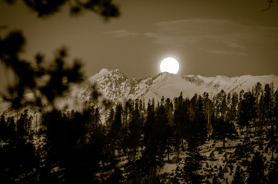 moonset over the Rockies Photograph by Stephen Holst