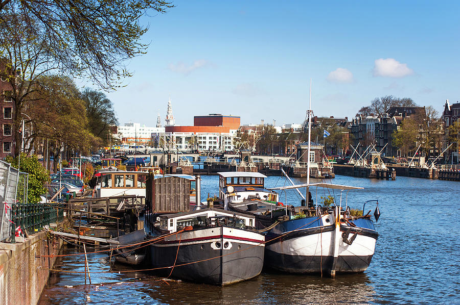 Moored Boats at Amsterdam Canal Photograph by Jenny Rainbow