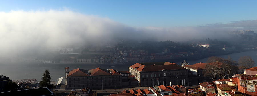 Morning clouds covering the city Photograph by Lukasz Ryszka