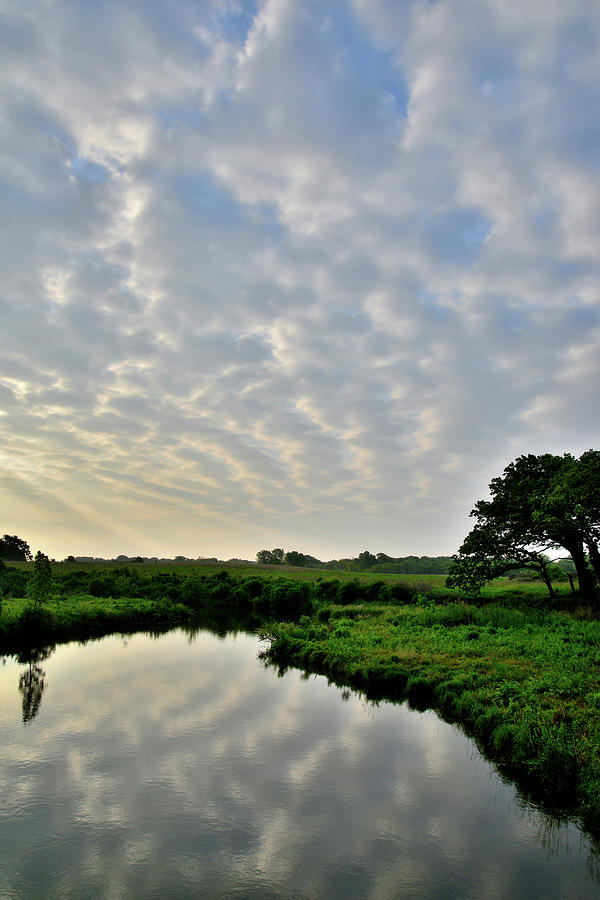 Morning Clouds Reflected in Nippersink Creek of Glacial Park Photograph by Ray Mathis