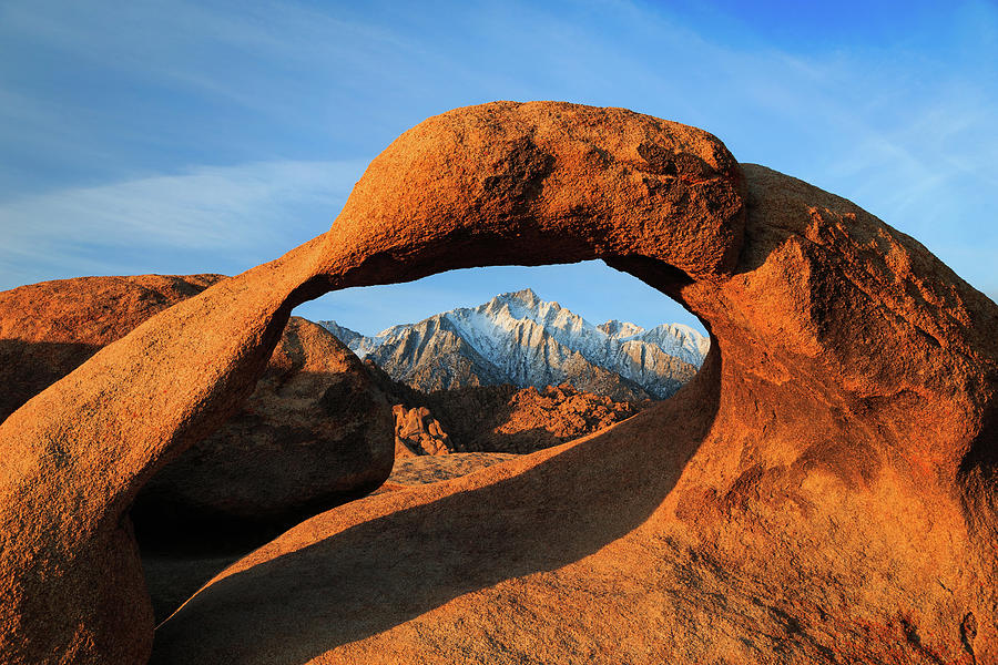 Mountain Photograph - Morning glow at Mobius Arch. by Wasatch Light