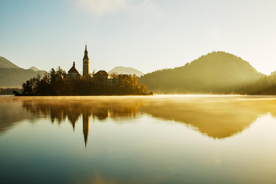 Morning light at Lake Bled Photograph by Ian Middleton