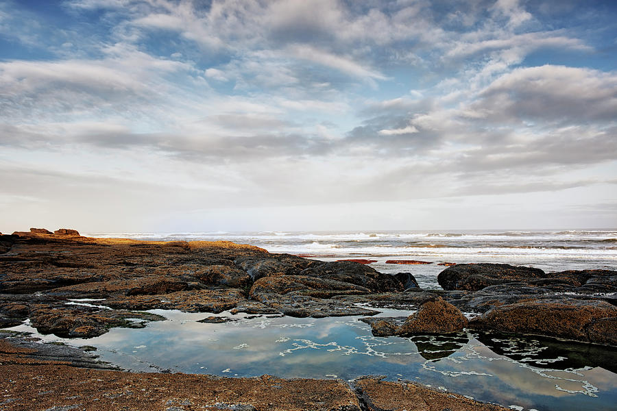 Morning low tide at Oregon's Yachat's Beach. Photograph by Larry Geddis