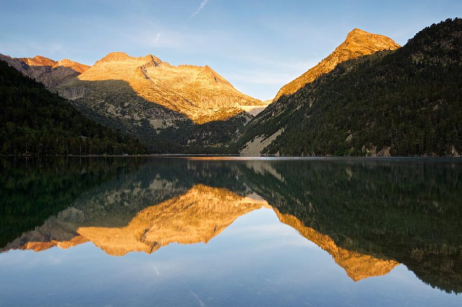 Morning reflections on Lac doredon Photograph by Stephen Taylor