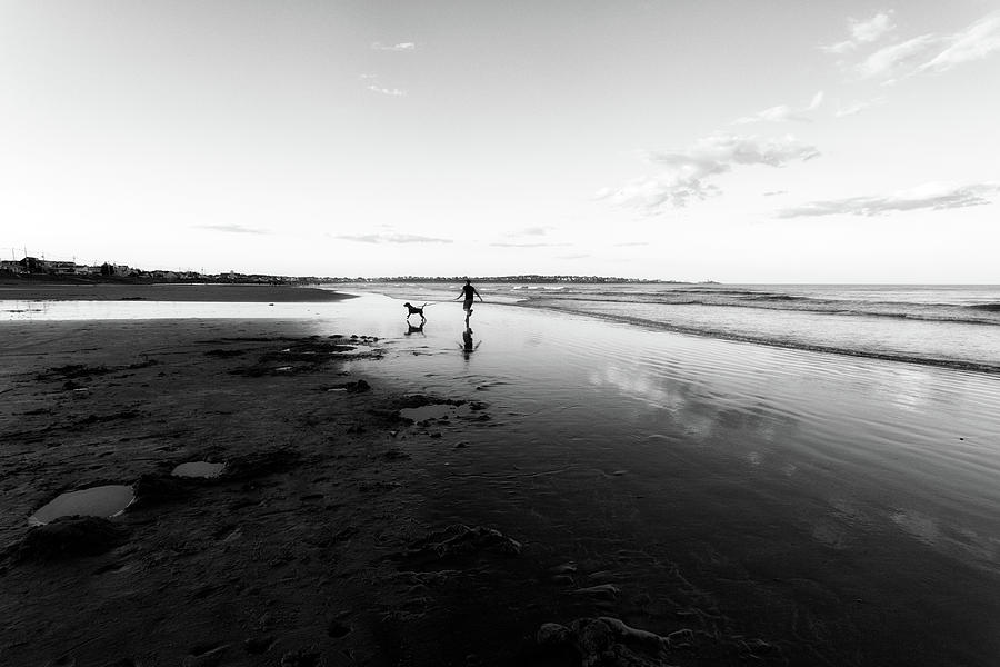 Morning Reflections On Long Sands Beach Photograph