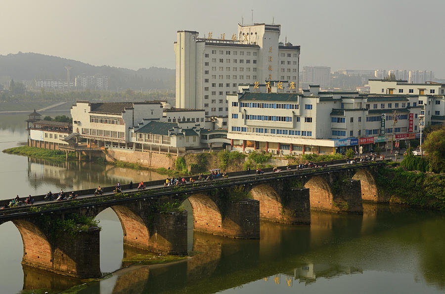 Morning rush on Ming Dynasty Zheng Hai bridge over Xinan river i