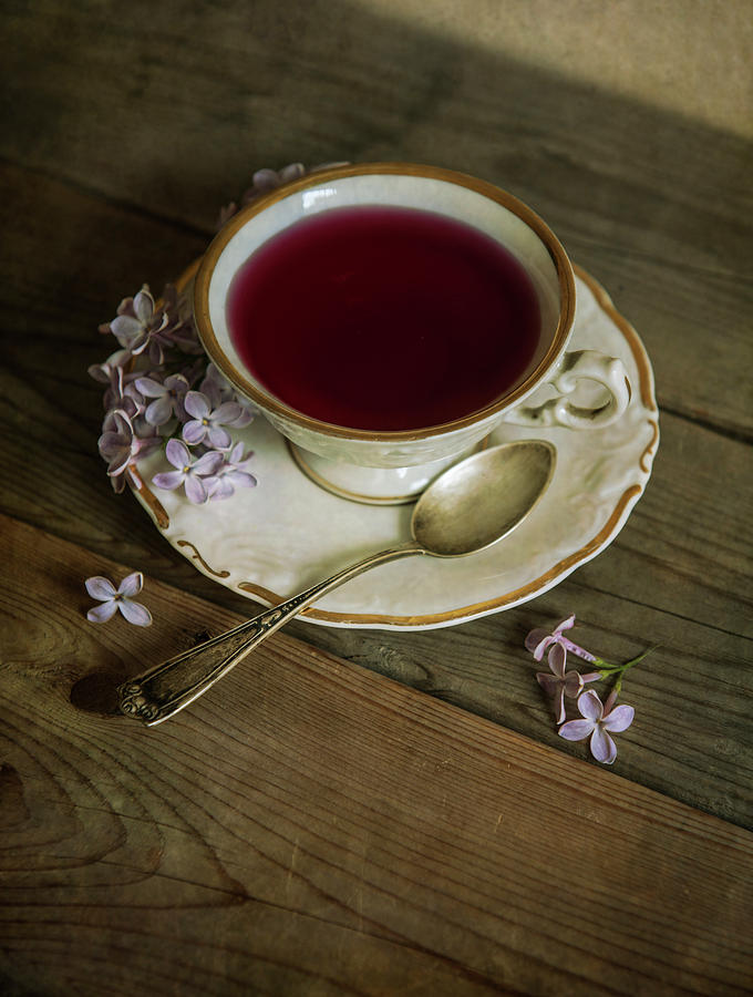 Morning tea with lilacs Photograph by Jaroslaw Blaminsky