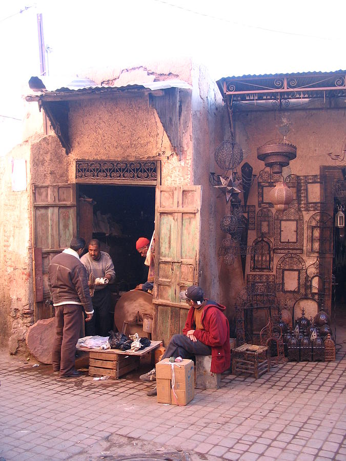 Morocco Photograph - Morocco Marrakesh market metal workers by Yvonne Ayoub