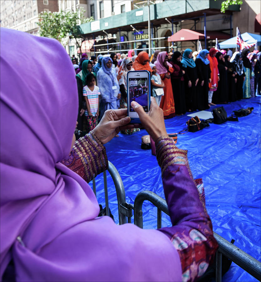 Moslem Day NYC 9_24_2017 Moslem Woman Taking a Photograph Photograph by Robert Ullmann