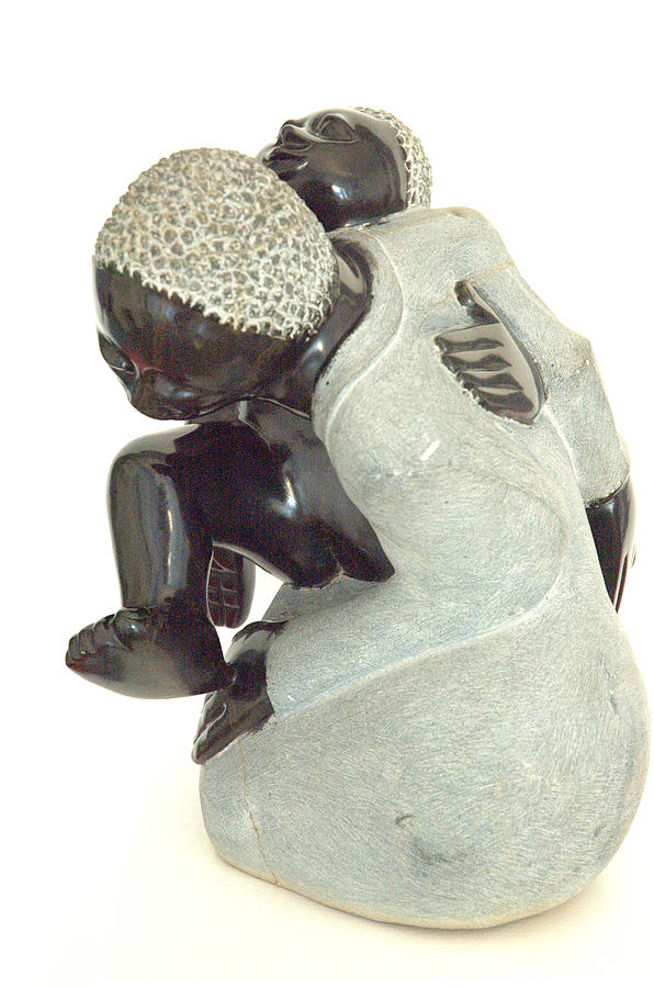 Springstone Sculpture - Mother and  a Happy Baby by Sylvester Cjitiyo