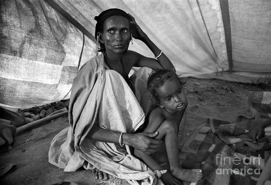 Mother and Child await for better Times, African Diaspora Photograph by Wernher Krutein