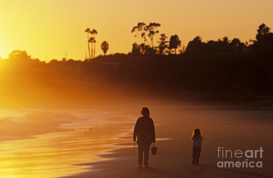 Mother and Daughter along Beach Photograph by Jim Corwin