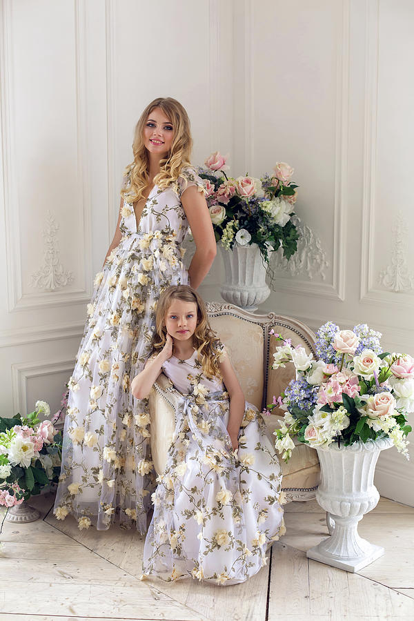 Mother And Daughter Are In The Same Floral Dresses Photograph By Elena