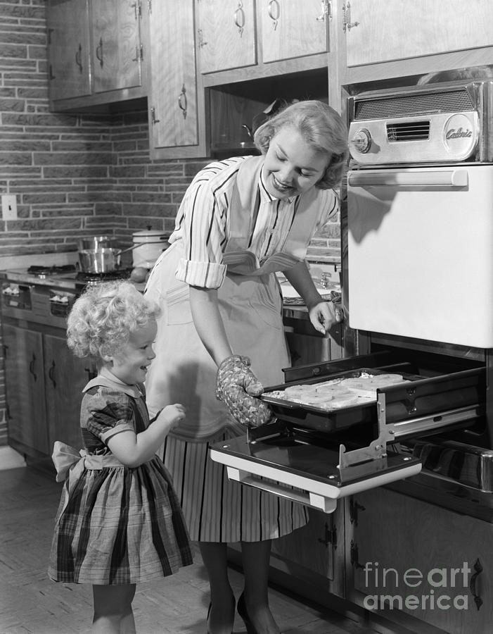 Mother And Daughter In Kitchen, C.1950s Photograph by H. Armstrong Roberts/ClassicStock