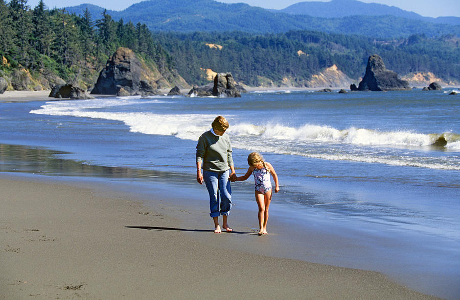 Mother and daughter on the Oregon Coast Photograph by Buddy Mays