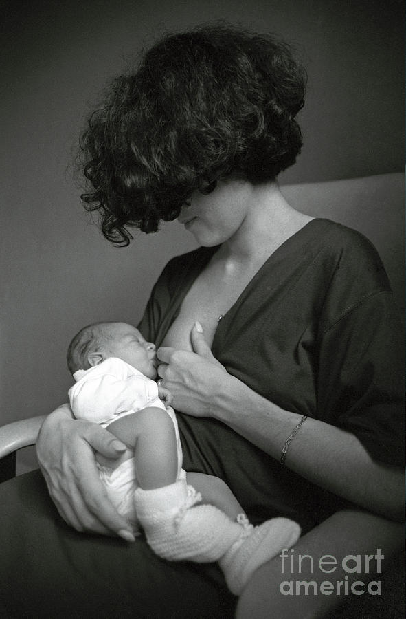 Portrait Photograph - Mother breastfeeding her newborn baby boy by Sami Sarkis
