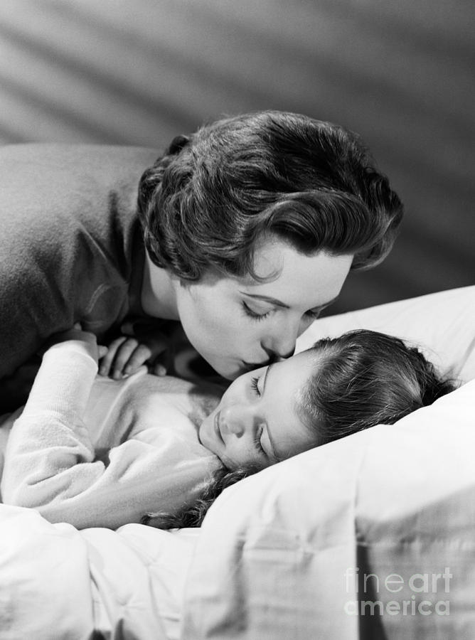 Parenthood Movie Photograph - Mother Kissing Girl Goodnight, C.1950s by H. Armstrong Roberts/ClassicStock