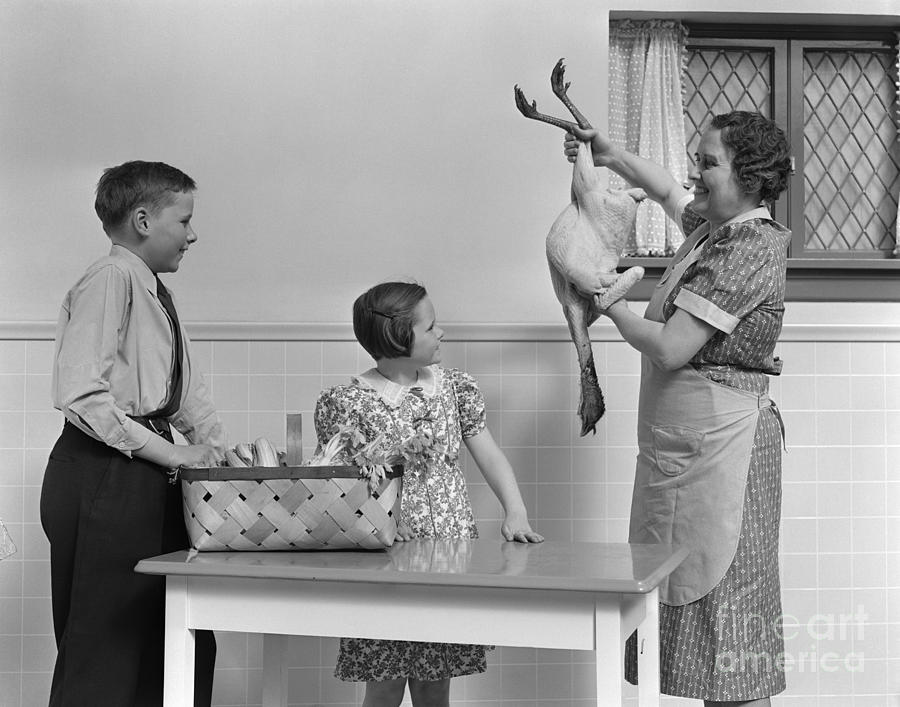 Mother Showing Turkey To Children Photograph by H. Armstrong Roberts/ClassicStock