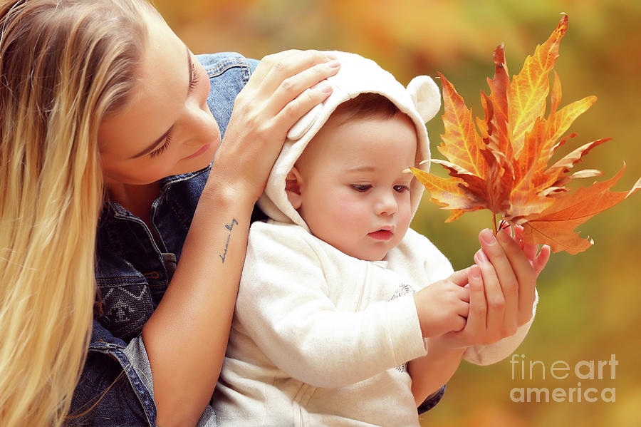 Mother with son enjoying autumn Photograph by Anna Om