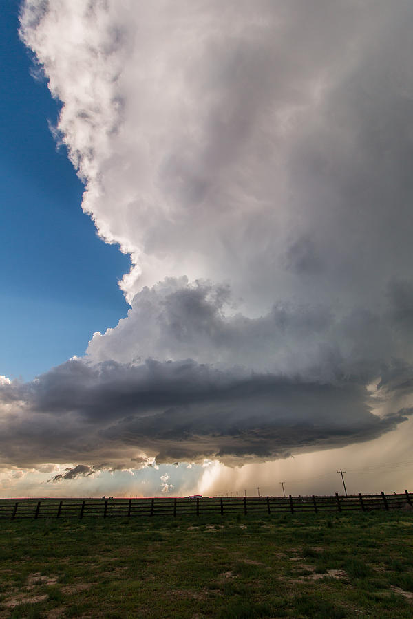 Mothership thunderstorm towers over the landscape Photograph by Tony ...