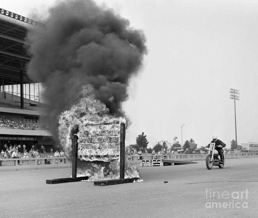 Motorcycle Stunt, C.1960s Photograph by H. Armstrong Roberts/ClassicStock