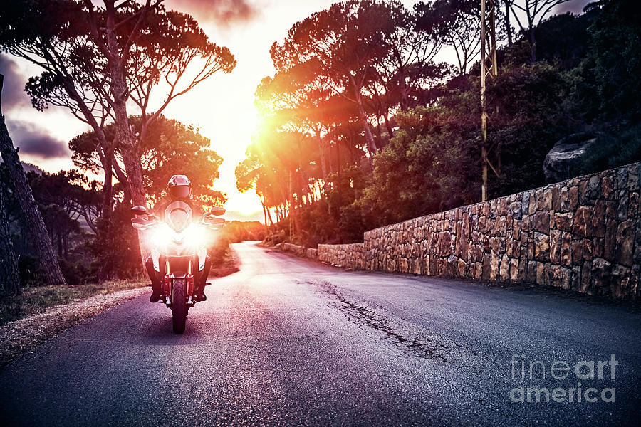 Motorcyclist in sunset light Photograph by Anna Om