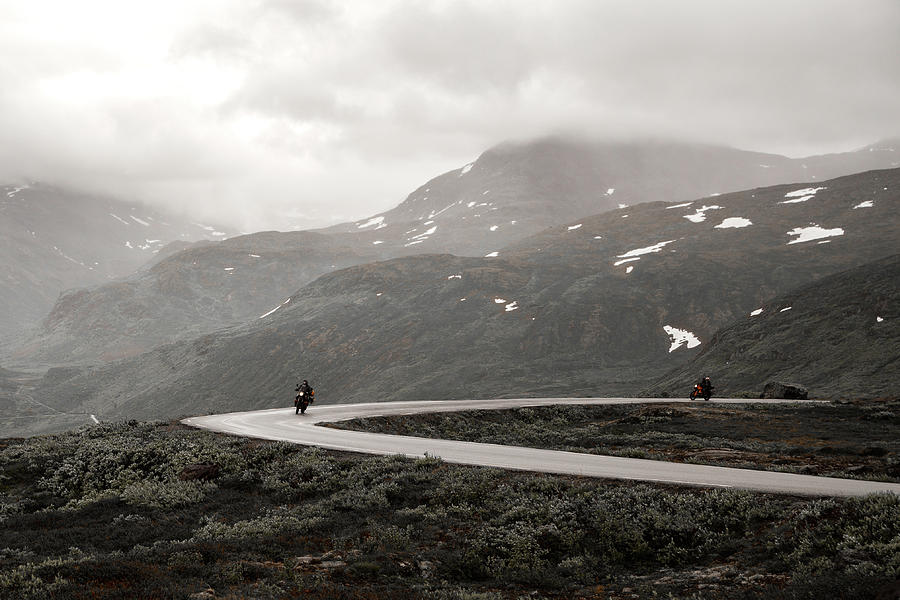 Motorcyclists on mountainous road trip Photograph by Aldona Pivoriene